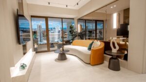 Living room opening onto the balcony in the model apartment at Aurum, Panama City, Panama